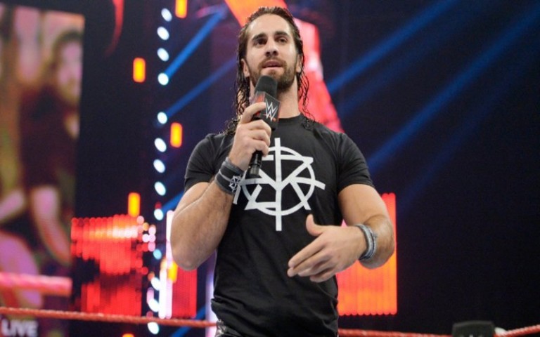 Watch A Fan Get Owned By Security After Getting In The Ring With Seth Rollins On Raw